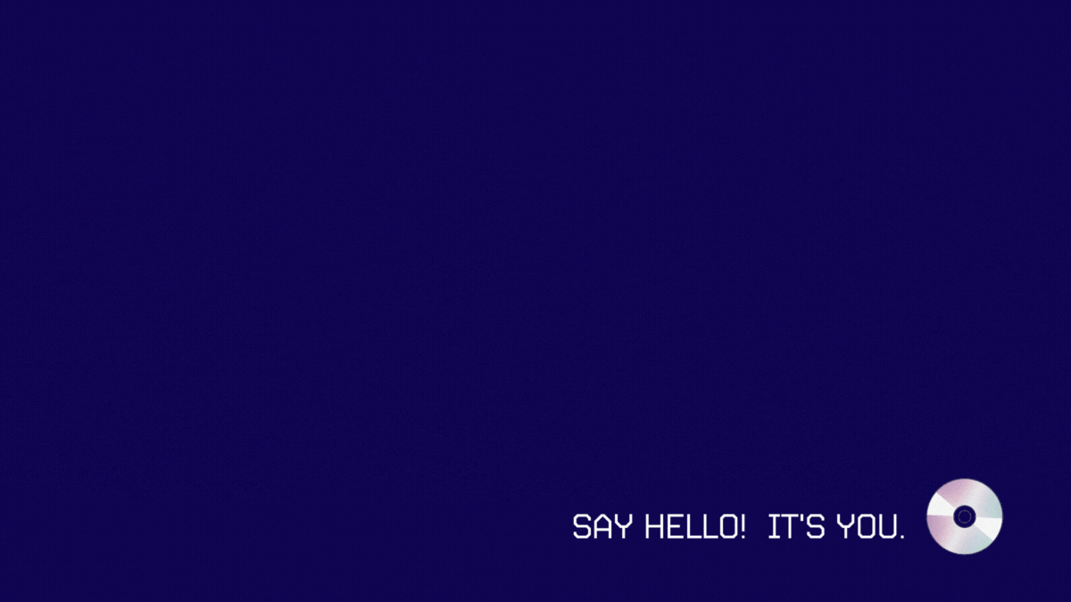 a game loading screen with an animated rotating disk in the lower left corner with the text 'SAY HELLO! IT'S YOU.'